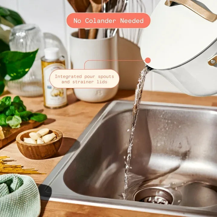 Wholesale Price with free shipping across the USA for Beautiful 12pc Ceramic Non-Stick Cookware Set with Strainer Lids, White Icing by Drew Barrymore - Manji Distributors