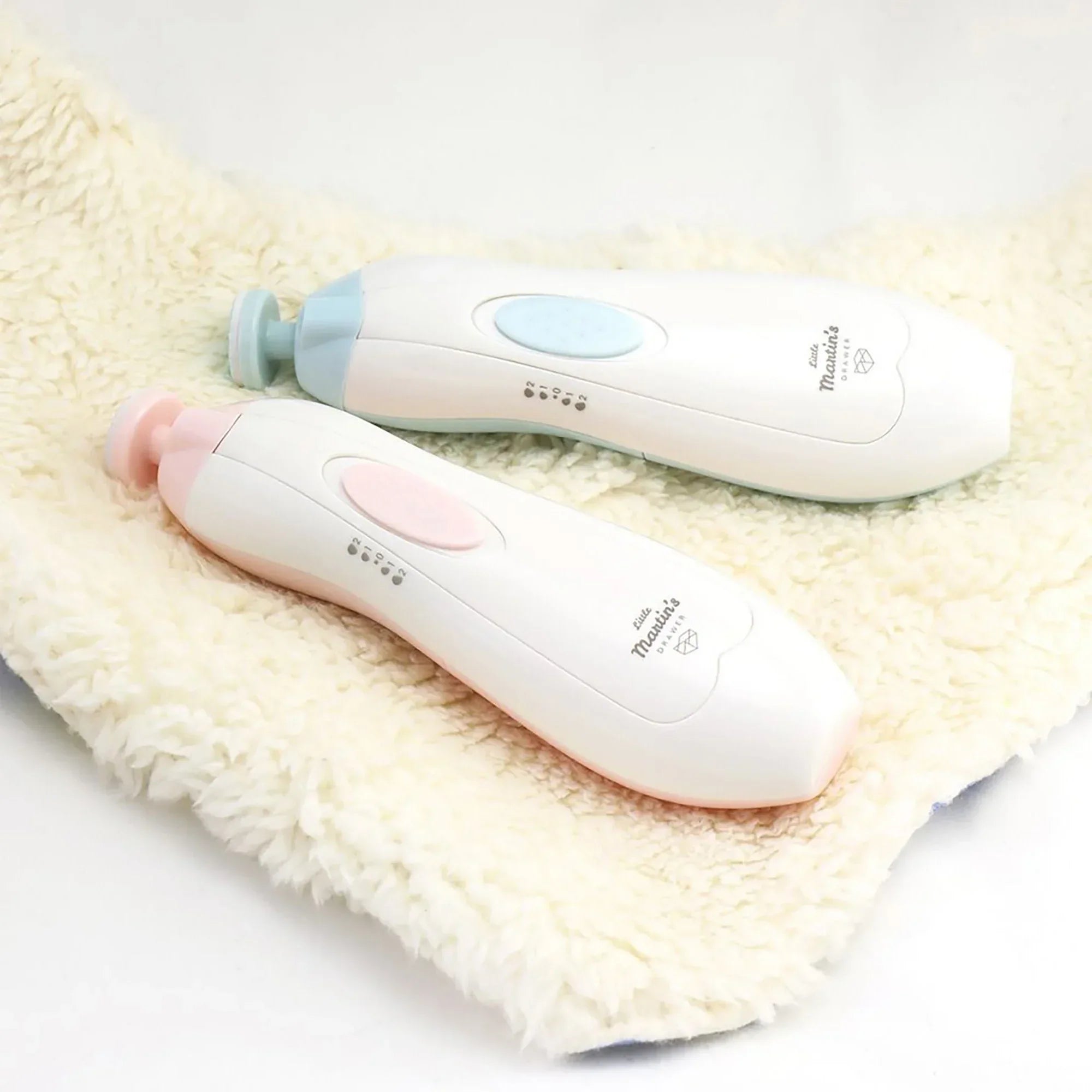 Wholesale Price with free shipping across the USA for Little Martin's: Baby Electric Nail Trimmer - Blue - Soft LED Light, Adjustable Speed, Interchangeable Heads, Finger & Toenail Filing, Infant-Kid Safe - Manji Distributors